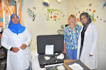 Cardiac nurses Kamla Al Bloushy and Zam Zam Al Salmi show past-president Sally Sleep the new TEE Probe.