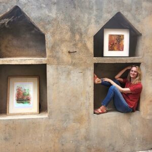 Bettina Steiger, German abstract artist based in Muscat, sitting with two of her framed paintings displayed in stone wall niches Description: Bettina Steiger is a German abstract artist who has been based in Muscat for over a decade. She works primarily in acrylics, acrylic inks, and watercolours, and her paintings are directly drawn from Oman's landscapes — wadis, desert dunes, the Hajar Mountains, coastal stretches — interpreted through an abstract lens that's entirely her own. She uses brushes, palette knives, and sometimes her hands, occasionally incorporating locally harvested sea salt and other materials into the work. Bettina has exhibited widely in Muscat, including solo shows at Matti Sirvio Gallery, and in March 2025 presented "Oman in Abstract" — a solo exhibition opened by the German Ambassador to Oman. Her work is also available internationally through Saatchi Art. If you're looking for original art that genuinely reflects Oman, made by someone who knows it well, this is worth exploring. WGO Member Discount: 10% off Conditions: None stated beyond standard WGO terms. How to Claim: Contact Bettina directly via Instagram or phone and mention your WGO membership before purchasing. Contact Details: 📍 North Ghubra, Muscat 📞 +968 9544 5136 / +968 7747 0347 📸 Instagram: @bettinasteiger_farbkleckse (No email or website provided — flagged below) SEO Fields: Focus Keyphrase: abstract artist Muscat Oman Meta Title (48 chars): Bettina Steiger | Abstract Artist Muscat Oman Meta Description (154 chars): WGO members get 10% off original artworks by Bettina Steiger, German abstract artist based in Muscat. Oman-inspired paintings in acrylics & watercolour. ⚠️ Flags to check before this goes live: What the discount covers — no conditions were provided. Confirm whether the 10% applies to original paintings only, prints, commissions, or all of the above. Saatchi Art — Bettina sells internationally through Saatchi Art. Confirm whether the WGO discount applies to direct purchases only, or whether it can also be referenced when purchasing through Saatchi. Website — no personal website found. Instagram is her primary channel. Saatchi Art profile (saatchiart.com/bettinasteigerfarbkleckse) could be worth linking as a secondary reference so members can browse her full portfolio. Commission work — based on her profile she takes commissions. Worth noting this in the listing if confirmed, as many WGO members may want something specific to their time in Oman. "North Ghubra" as location — this is likely a studio or home address rather than a public gallery. Confirm whether visits are by appointment and how members should arrange to view or buy work — the description currently implies contact via Instagram or phone first, which is the safest assumption. Sonnet 4.6