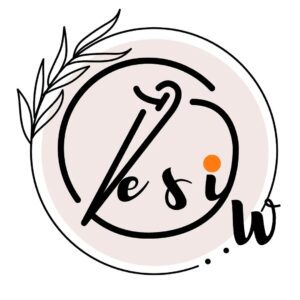 Desi W Artisanal Gifts circular logo with botanical leaf motif, Indian artisanal gifts business based in Muscat, Oman