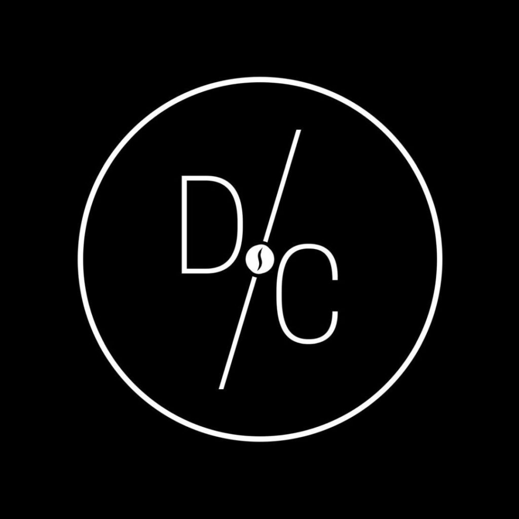 Department of Coffee D/C circular logo, specialty coffee café on the 1st floor of SABCO Commercial Centre, Qurum, Muscat