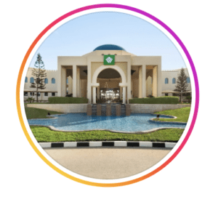 Exterior view of Wyndham Garden Salalah Mirbat hotel showing a grand arched entrance, ornamental pool and landscaped grounds, Salalah, Oman