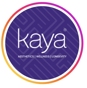 Circular purple logo for Kaya Skin Clinic with white lettering and the tagline Aesthetics, Wellness, Longevity, with a pink and orange gradient border, Shatti Al Qurum, Muscat