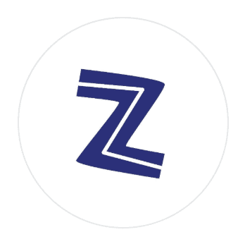Circular white logo for Zorba restaurant featuring a bold navy blue Z monogram, at St Regis Al Mouj Muscat