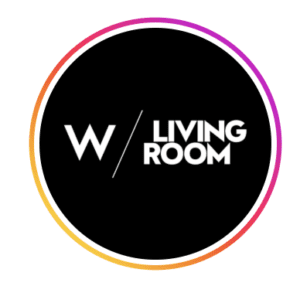 Circular black logo for W Living Room with bold white lettering and a pink and orange gradient border, at W Muscat, Shatti Al Qurum, Muscat