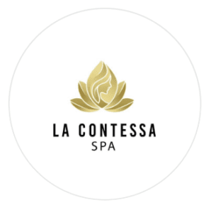 La Contessa Spa logo featuring a gold lotus flower with a woman's profile illustration and bold black lettering, a spa on 18th November Street, Azaiba, Muscat