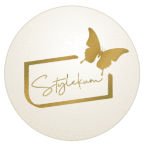 Circular cream and gold logo for Stylekum Oman featuring a butterfly illustration and script lettering, a halal vegan organic cosmetics brand at Al Araimi Boulevard, Muscat